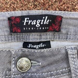 Fragile brand skinny jeans, in Dusty gray w/ cool stitching on back pockets.